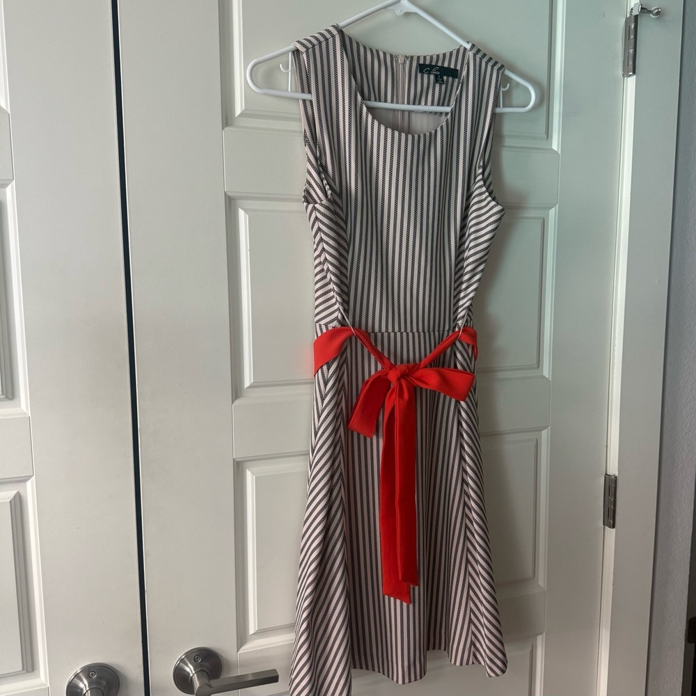 C. Luce Black/Navy and White Striped Dress with orange tie at waist. Size S